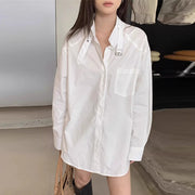 Asymmetric Buckle-Neck Shirt
