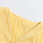 Flared-Cuff Ruffle-Hem Blouse