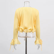 Flared-Cuff Ruffle-Hem Blouse