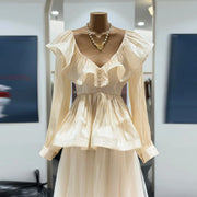 Ruffle-Neck Peplum Blouse
