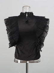 Ruffled-Bib Sleeveless Blouse